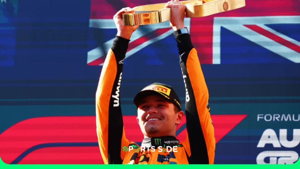 Lando Norris is on the podium, celebrating his victory at the 2025 Australian GP.