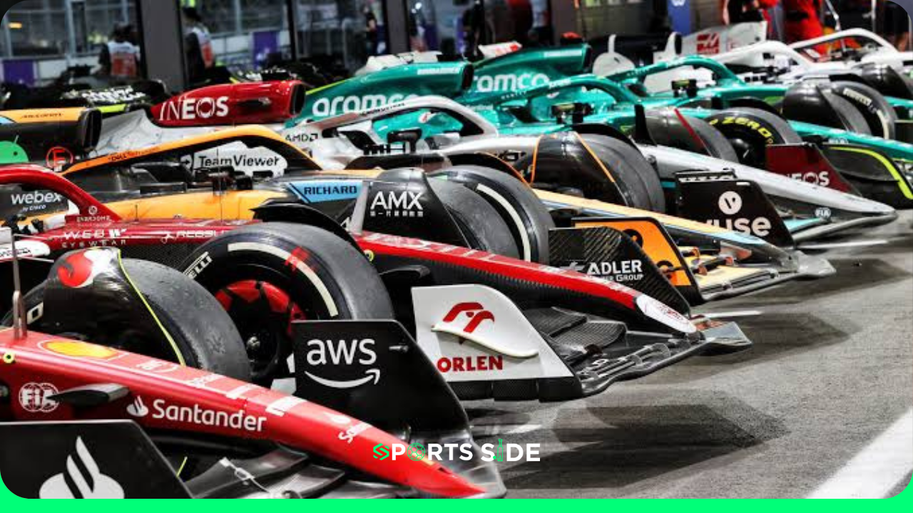 F1 cars parked together with front wings in focous.